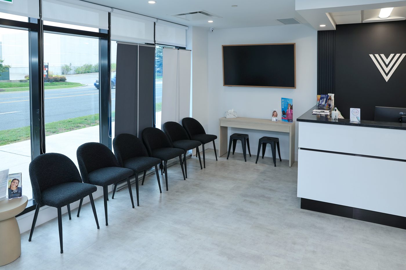 Bright waiting area with seating at Vivid Smiles Orthodontics